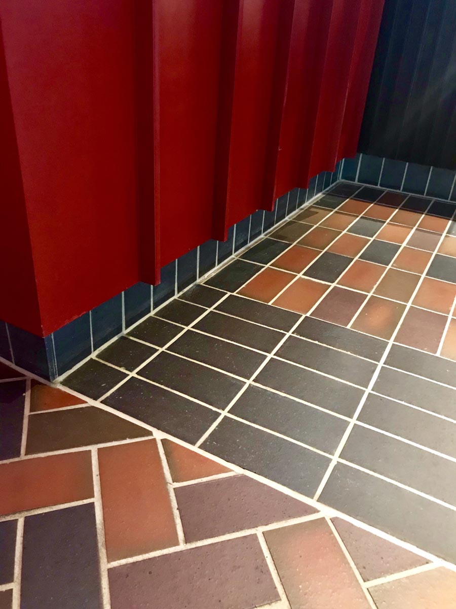 a combination of quarry tile laying patterns and colours are used at the British Film Institute at Riverside London